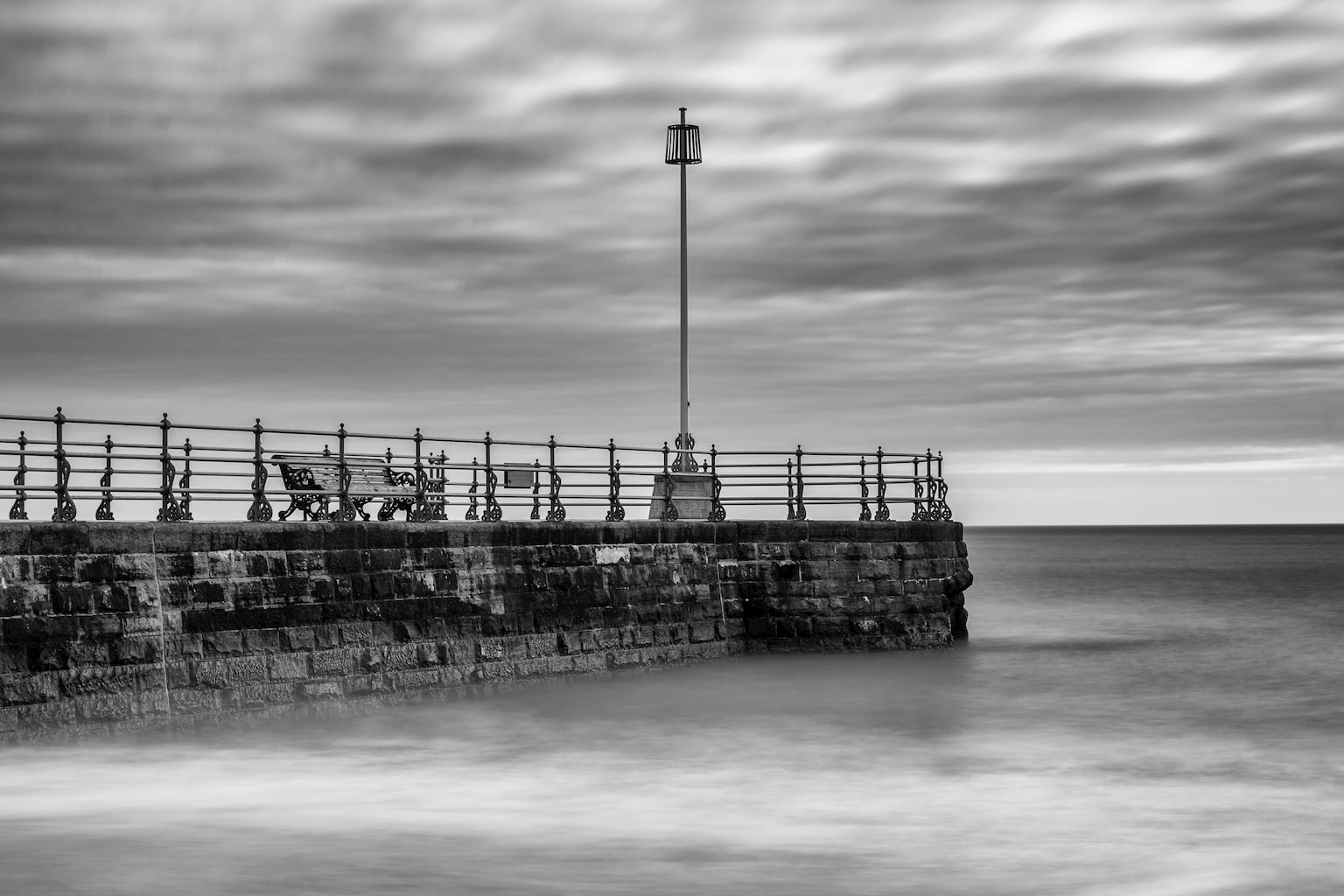 A Black and White Fine Art photograph of The Bango Pier at Swanage, Dorset. 